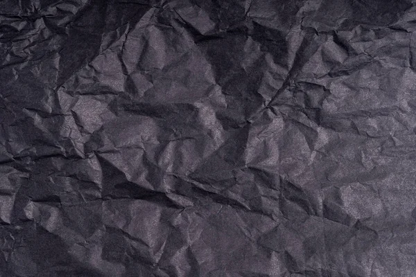 黑色皱巴巴皱巴巴的黑纸海报纹理 空白皱皱的皱皱巴巴的纸纹理表面 用纤维弄脏了的怨恨的硬纸板 靠近点包装用物质组织 — 图库照片