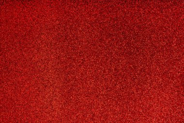 Soyut kırmızı, canlı, şenlikli, odaklanmış arka plan. Noel arkaplanındaki şenlikli parıltı. Işık efektiyle parıldayan yüzey. Bulanık, bokeh, dağılmış. Parti dekorasyonu. # Tatil ışıltısı #