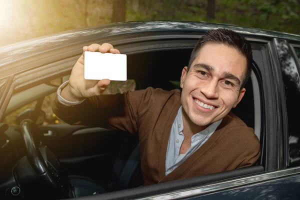 Portrait Young Smiling Man His New Car Posted Window Showing — Stock Photo, Image