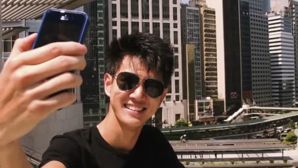 Young man taking selfie — Stock Video