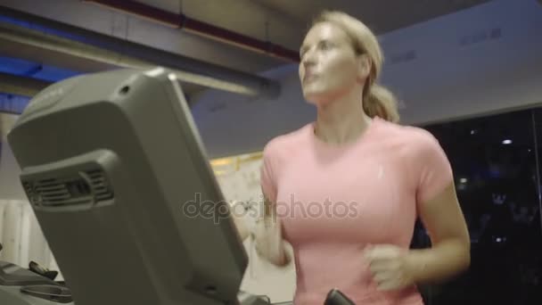 Group Of Adult Women Exercising On Treadmill Stock Video Group Of Adult Women Exercising On Treadmill Stock Video