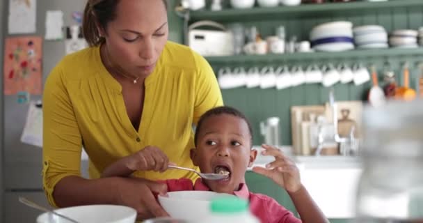 Mum Helping Son Breakfast — Stock Video