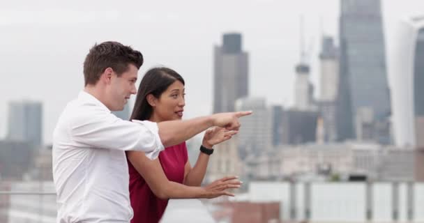 Business Colleagues Discussing London City Skyline — Stock Video