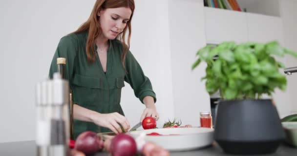 Adult Female Adding Fresh Basil Dish — Stock Video