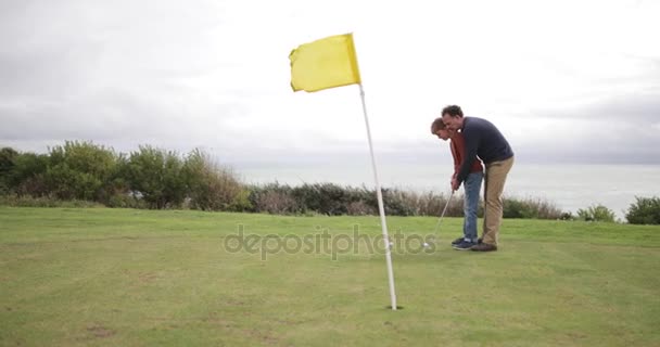 Father Teaching Son How Play Golf — Stock Video