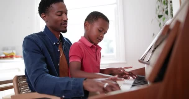 Father Teaching Son Play Piano — Stock Video