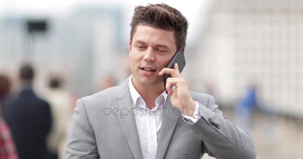 Businessman Talking Smartphone Crowded Street — Stock Video