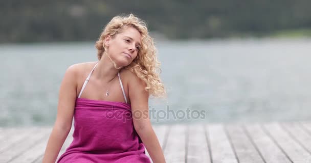 Young Adult Female Sitting Jetty Relaxing — Stock Video