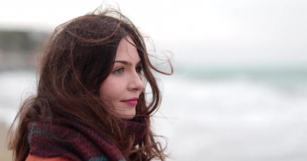 Woman Looking Thoughtfully Out Sea — Stock Video