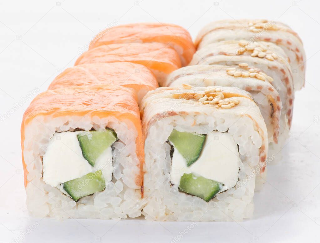 Tasty fresh sushi rolls isolated on white background. Japanese cuisine, asian food. Seafood, fish, rice