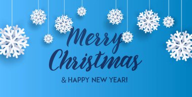 Mutlu Noeller ve mutlu yıllar tebrik kartı. Beyaz 3d origami kar taneleri ve aralarında kaligrafi