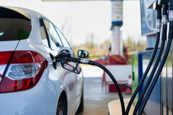 Gasoline taxes stock photo, refueling the gas at the gas station image