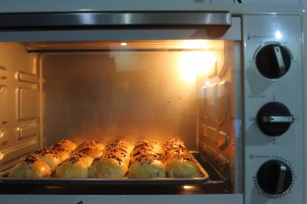 Baked Bun In Front Of Microwave Oven Stock Photo By C Dourleak 59698167