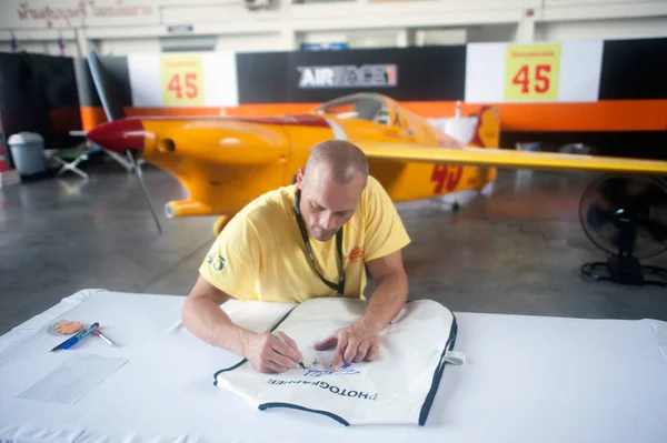 Pilots is signature for tourist in Airrace 1. — Stock Photo, Image