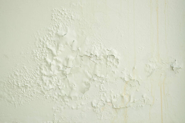 White wall with cracks.