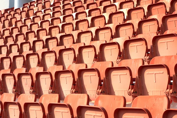 Kleurrijke stadion zitplaatsen op achtergrond. — Stockfoto