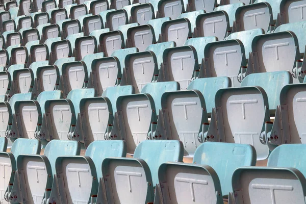 Coloré de sièges de stade en arrière-plan . — Photo