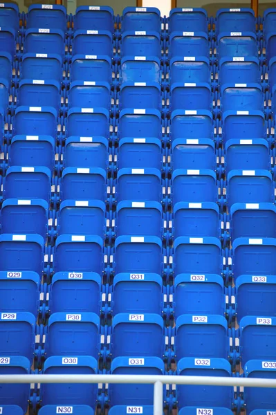 Colorful of stadium seats in background. Stock Image