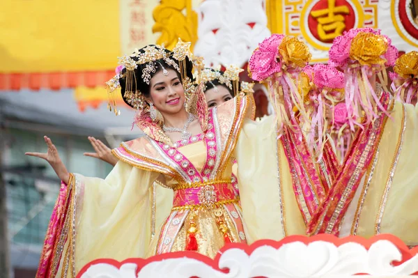 Beautiful woman angel show on parade in Chinese New Year festival. — Stock Photo, Image