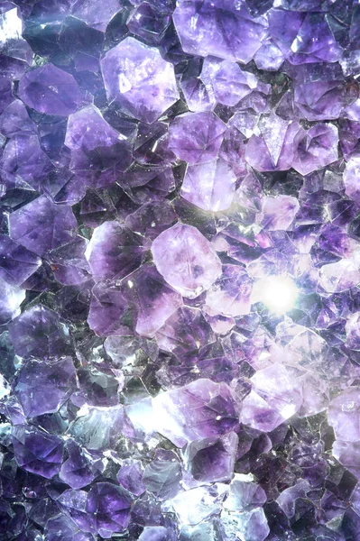 Amethyst geode on black background. Beautiful natural crystals gemstone. — Stock Photo, Image