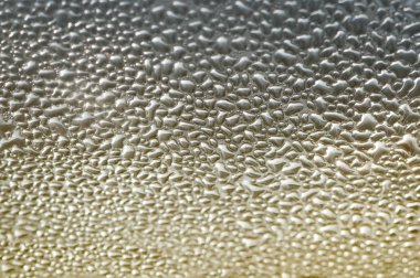 Makro doku arka plastik üzerinde damla.