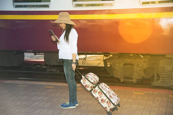 Pretty Asian Traveler Female Looking Tablet Drag Luggage Waiting Train — Stock Photo, Image