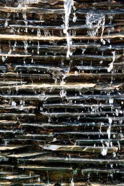 Waterfalls, fountains decorated with stones stacked in the building to decorate beautifully. — Stock Photo, Image