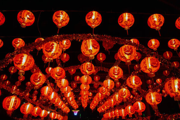 The traditional red lantern on the black sky at night in Chinese new year,Thailand.