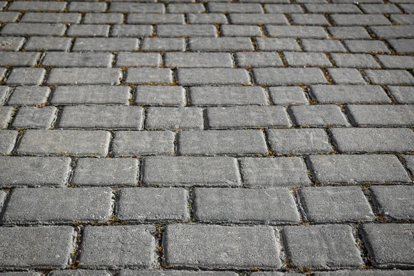 kaldırım taşlarıyla döşenmiş sokak arkaplanı