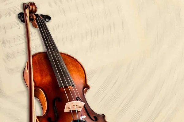 Photo of a violin on a white background with blurry notes — Stock Photo, Image