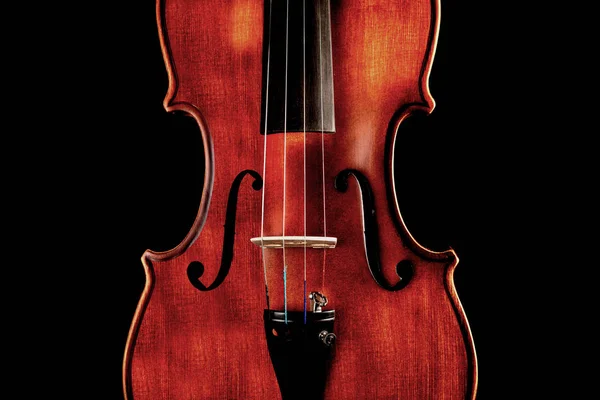 Photo of a violin on a black background — Stock Photo, Image
