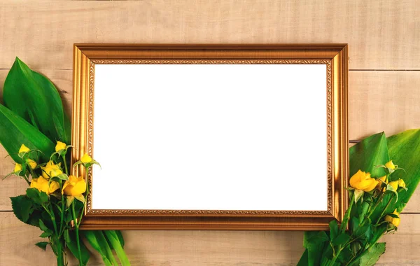 Two bouquets of yellow roses and a frame for a photo — Stock Photo, Image