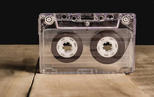 Cassette with music on a wooden table Stock Photo
