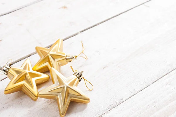 Parlak altın christmas dekorasyon, yansıma Isola yıldızlarla — Stok fotoğraf
