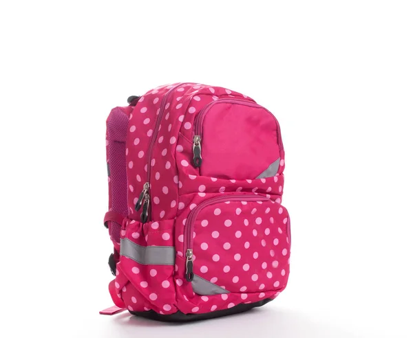 Рюкзак розовой школы с белыми точками, изолированными на белом — стоковое фото