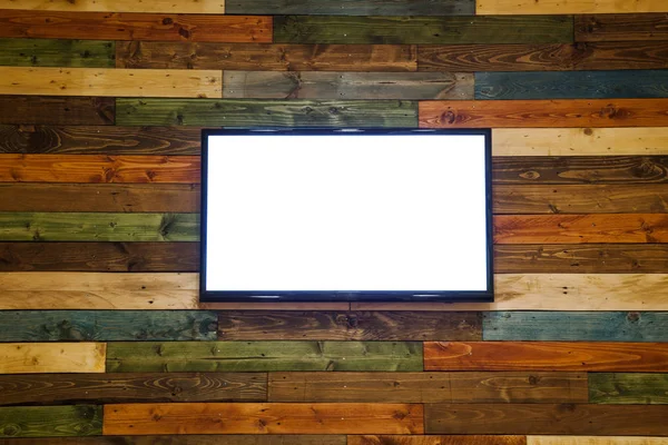 TV al plasma sulla parete di legno della stanza, TV al plasma appesa alla parete . — Foto Stock