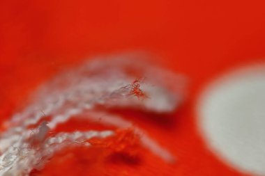 arkaplan için soyut makrodaki kumaşın güzel kırmızı dokusu