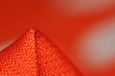 arkaplan için soyut makrodaki kumaşın güzel kırmızı dokusu