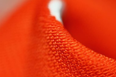 arkaplan için soyut makrodaki kumaşın güzel kırmızı dokusu