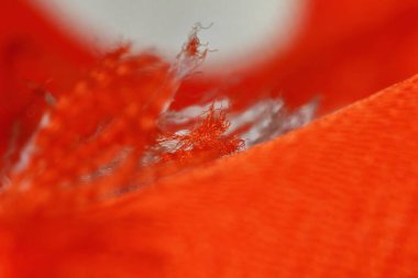 arkaplan için soyut makrodaki kumaşın güzel kırmızı dokusu