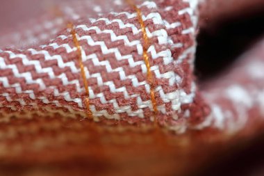 Güzel bir arkaplan için soyut makro kumaş içinde güzel kırmızı ve beyaz kumaş dokusu