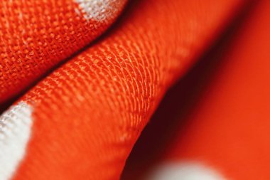 arkaplan için soyut makrodaki kumaşın güzel kırmızı dokusu