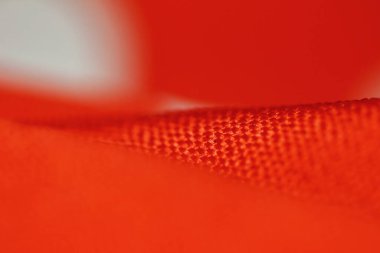 arkaplan için soyut makrodaki kumaşın güzel kırmızı dokusu