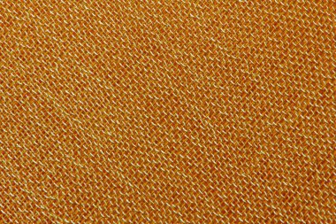 Arka plan için soyut makro kumaşların güzel sarı dokusu