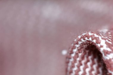 Güzel bir arkaplan için soyut makro kumaş içinde güzel kırmızı ve beyaz kumaş dokusu