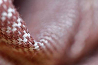 Güzel bir arkaplan için soyut makro kumaş içinde güzel kırmızı ve beyaz kumaş dokusu