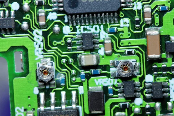 old electonic circuit board for computer in macro photography for electric background