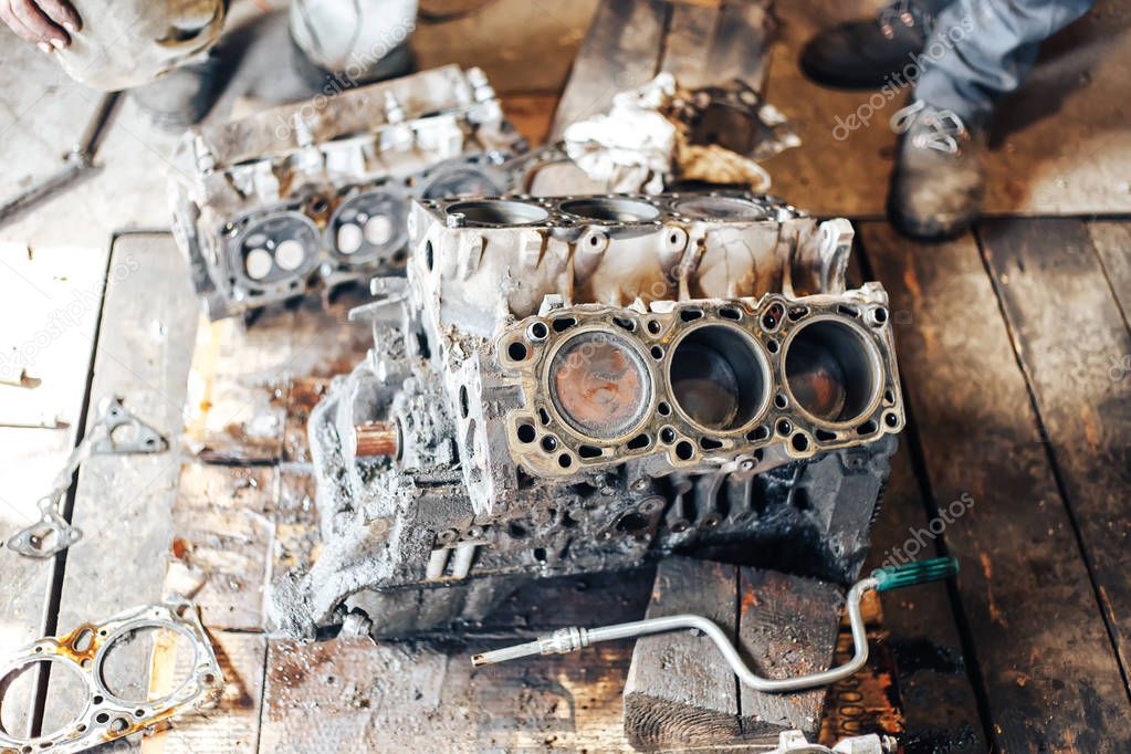 dirty auto engine in garage