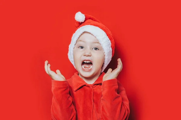 Niño pequeño en traje de Santa —  Fotos de Stock
