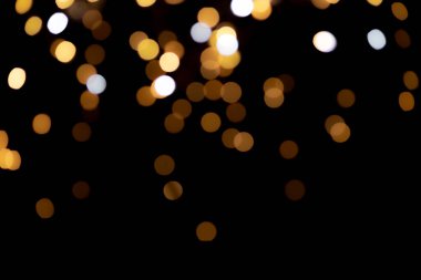 Siyah arkaplanda bokeh ışıkları